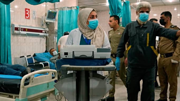 قصة فيديو "الكر والفر" بمستشفى النجف