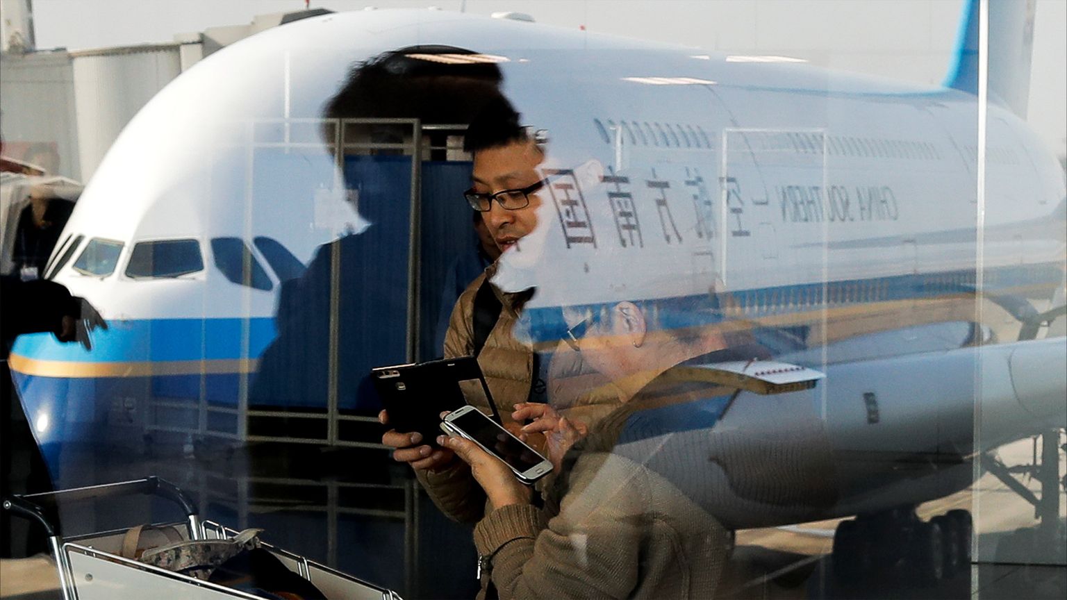 مطارات بكين "داخل الخدمة" رغم الأزمة العالمية